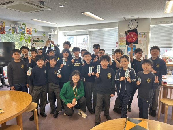 Picture of Yangsook Choi with the students