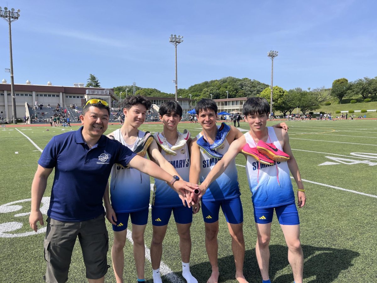 4x100m team with their coach, Mr. Ichikawa