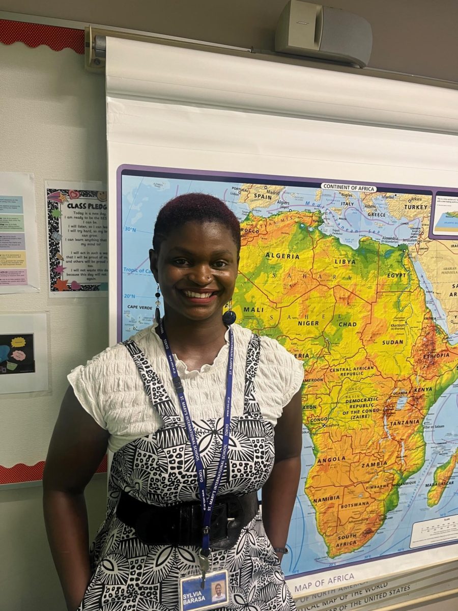 Photo of Ms. Barasa in her classroom.