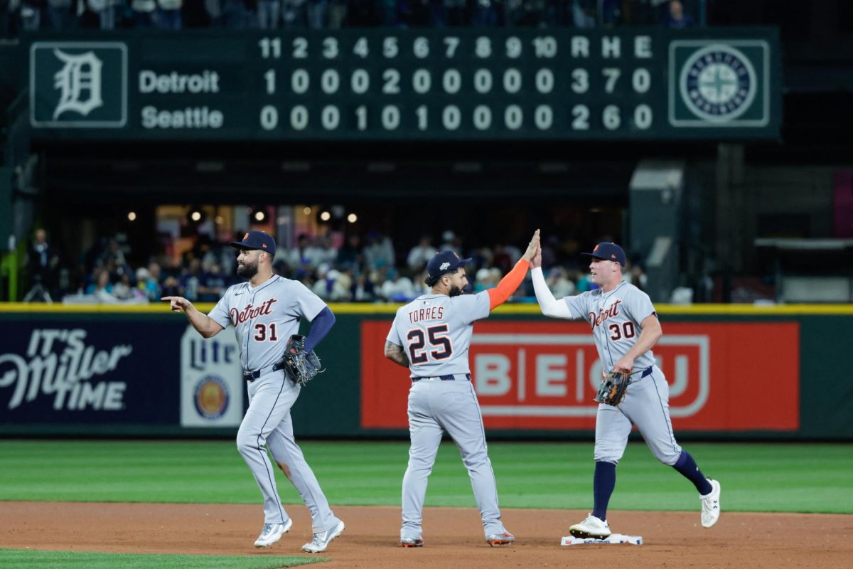 Oct 4, 2025; Seattle, Washington, USA; Detroit Tigers second baseman Gleyber Torres (25) celebrates with outfielder Kerry Carpenter (30) after defeating the Seattle Mariners during game one of the ALDS round for the 2025 MLB playoffs at T-Mobile Park. Mandatory Credit: Joe Nicholson-Imagn Images